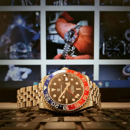 Montre mécanique pour homme PAGANI DESIGN (40 mm) – Cadran violet, fonction GMT, bracelet type Jubilee, verre saphir, étanche, mouvement automatique