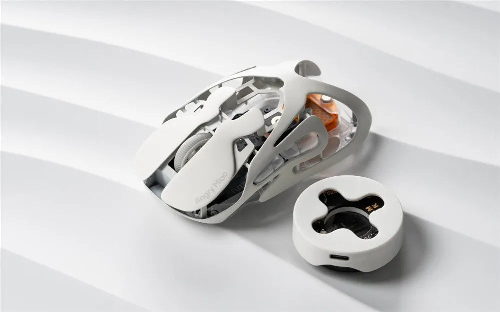 Mouse gaming wireless Angry Miao Infinity, metallo ultraleggero hollow, hot-swappable, PAW3950, dual 8K cablato, tri-mode