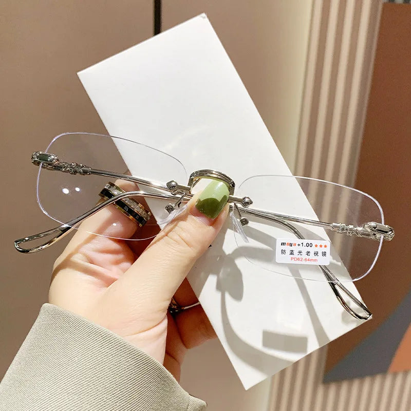 KLASSNUM Men Rimless Anti-Blue Light Glasses Photochromic Glasses Women Alloy Frame Ultra Light Computer Goggles Sunglasses 2025