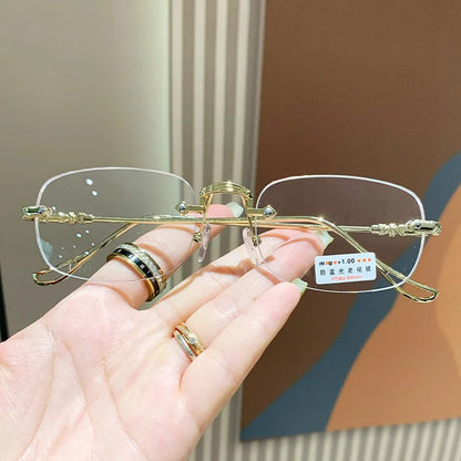 KLASSNUM Men Rimless Anti-Blue Light Glasses Photochromic Glasses Women Alloy Frame Ultra Light Computer Goggles Sunglasses 2025
