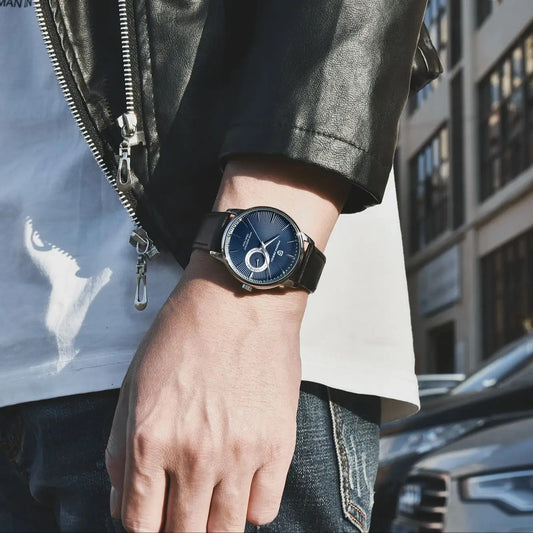 Relógio de quartzo casual para homem PAGANI DESIGN – Estilo «luxo acessível», versátil, com vidro tratado, resistente à água, caixa em aço inoxidável e indicação da data.