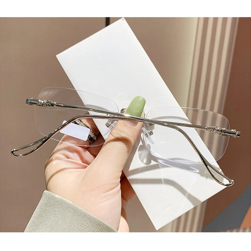 KLASSNUM Men Rimless Anti-Blue Light Glasses Photochromic Glasses Women Alloy Frame Ultra Light Computer Goggles Sunglasses 2025